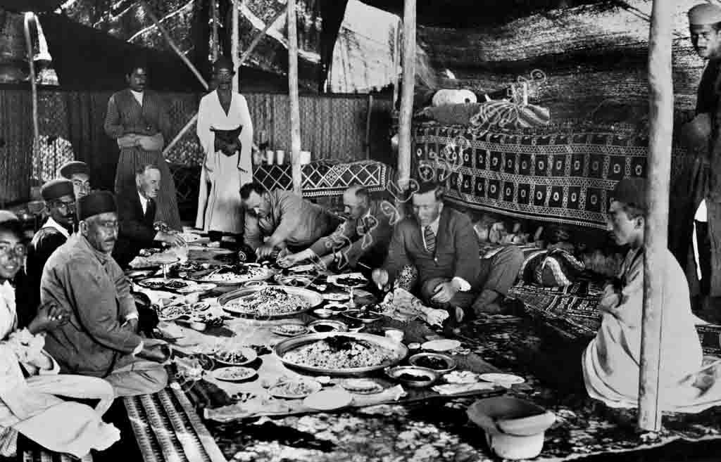 Members of Anglo-Iranian Oil Company having lunch in Kashkooli-Khan tent in winter camp 1925
